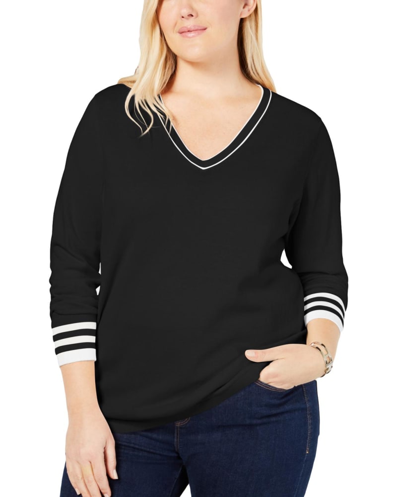 Front of a model wearing a size 1X Tommy Hilfiger Women's Plus Cotton V Neck Sweater Black Size 1X in Black by Tommy Hilfiger. | dia_product_style_image_id:314372